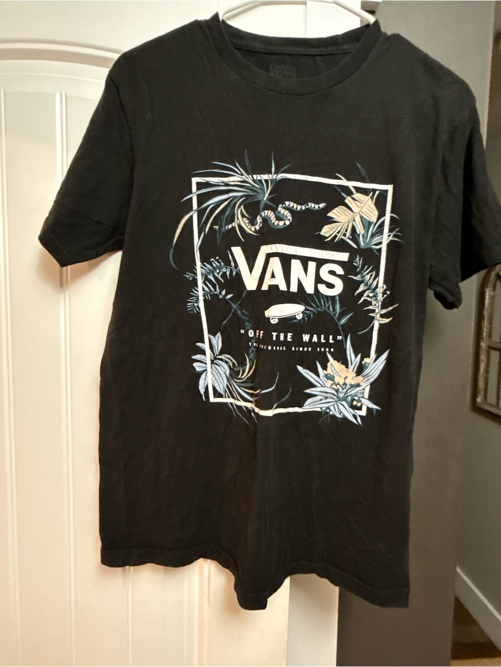 Vans Black Short Sleeve Tee with Blue and Cream Floral Logo